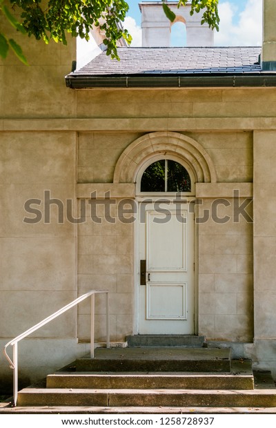 Arched entry\
way, gothic revival, classically styled in Italianate style.\
Exhibits a remarkable degree of\
integrity.