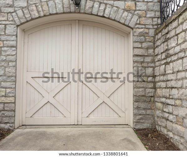 Arched Garage Door Surrounded Stone Wall Stock Photo Edit Now
