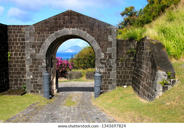 An arched gate at\
historic Brimstone Hill Fortress in St. Thomas Middle Island\
Parish, St. Kitts