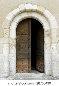 Arched Medieval Church Door With Stone Lintel