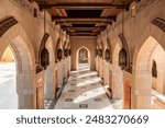 Arched passageway at the Sultan Qaboos Grand Mosque. Islamic architecture, Muscat, Oman.