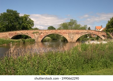 Arched Stone Bridge Over River Tyne Haddington In Summer