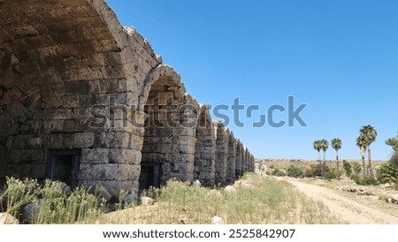Arched stone  buildiings in the eastern side of the stadium of the  Perge ancient city located in Aksu district of Antalya province in Turkey