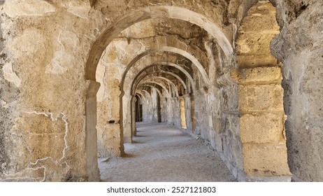 Arched stone corridor  at theupper part of the Aspendos Ancient Theatre - Powered by Shutterstock