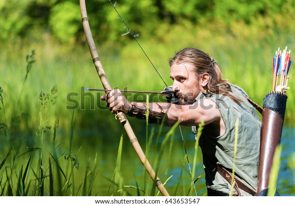 archer shooting arrow towards the stars