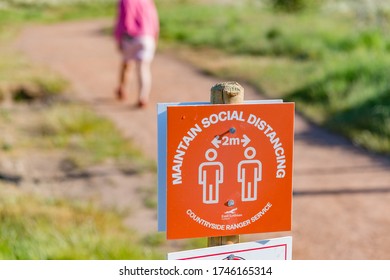 Archerfield, East Lothian, UK - May 31st 2020: Local Authority Signs To Encourage Social Distancing When Walking.