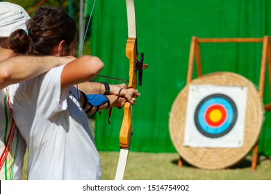 Archery Course. The Teacher Teaches The Student To Aim At The Goal.