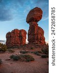 Arches National Park is home to many enormous natural sandstone arches like Turret Arch, The Windows, and Delicate Arch, and formations like Balanced Rock.