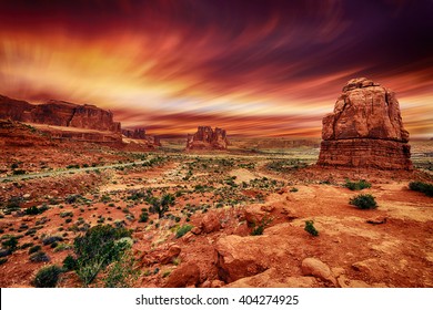 Arches National Park At Sunset. Blurry Sky. Long Exposure.