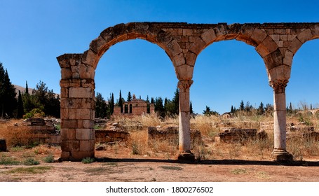 Arches Of Ruins Of The Mosque Frame The Facade Of The Grand Palace Of The Umayyad Dynasty, Bekaa Valley, Lebanon, Middle East, Color