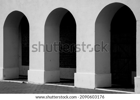 Arches of a white architectural building