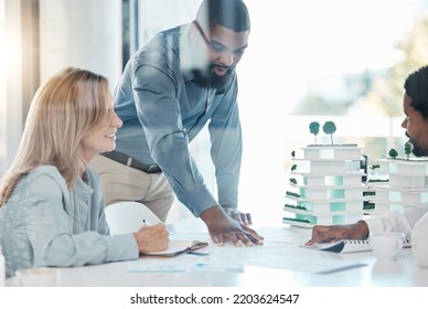 Architect, building engineer and meeting with 3d model design in real estate business, construction or property company. Black men or architecture woman in teamwork collaboration with blueprint paper - Powered by Shutterstock