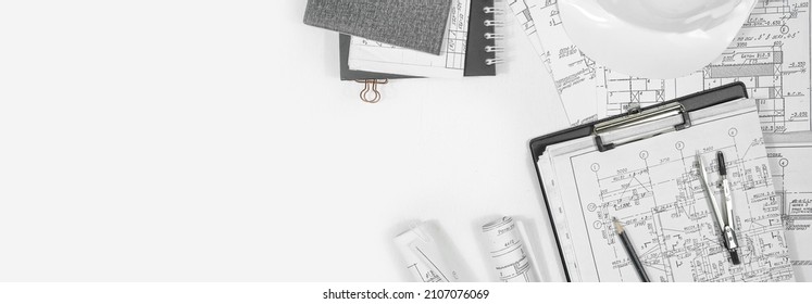 architect design working drawing sketch plans blueprints and making architectural construction model in architect studio,flat lay,architect background	 - Shutterstock ID 2107076069