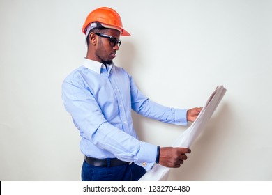 Architect Designer Black Man African American Holding Paper Drawing Template.happy African Builder Painting House,businessman Wears A Helmet Hard Hat.young Guy Is Painting Sketch Construction Plan