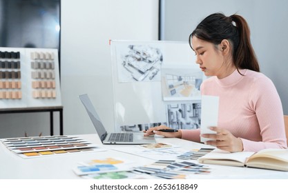Architect designer Interior creative working drawing sketch plan selection material color samples art tools Design Studio.Photo concept of work on technical drawings.material sample on creative desk.