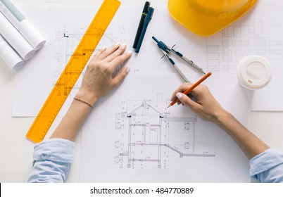 Architect drawing blueprints  architectural project in progress  Construction engineering