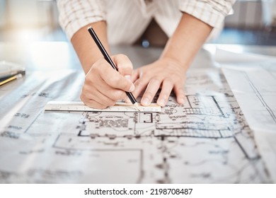 Architect drawing building floor plan, design blueprint map and engineer drafting structure on table paper. Real estate development work office construction and industrial wall safety ruler