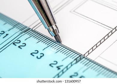 Architect Drawing A House Plan With The Help Of His Tools Pencil And Ruler