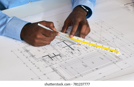 architect drawing on a building project with a ruler and pen - hands, architectural, construction plan, pencil, house plan, blueprint