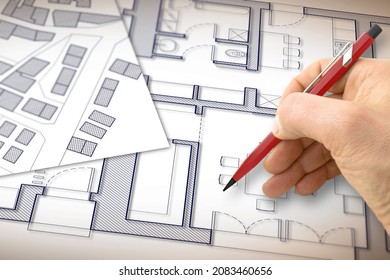 Architect drawing a planimetry of a residential building whit an imaginary cadastral map of territory.