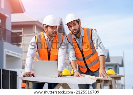 Architect and engineer foreman in helmet working on a building site,Civil engineer project construction work.