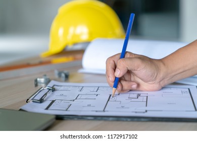 Architect & Engineer Working Drawing Document About Project Planning And Progress Of Work Schedule On The Home Building Construction Site ,