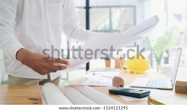 Architect or engineer working in office,
Construction concept. Engineering
tools.