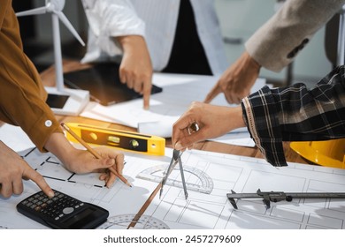 architect or engineer working on table use drawing tool on the paper plan for business architectural project.