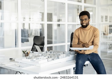 Architect feeling creative while making some changes in a mockup