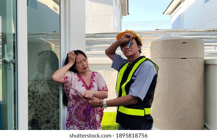 Architect man and woman are checking documents for construction. - Shutterstock ID 1895818756