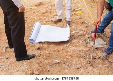 Architect Plans Surveying Prepare Work Construction New Building On Land Empty