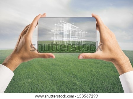 Architect showing new house project with tablet