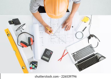 Architect sketching construction project