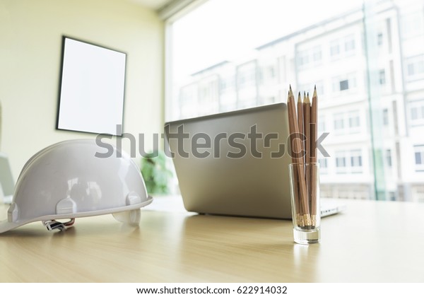 architect tools with architecture blueprint on desk\
in office, engineering concept, architecture concept, soft focus,\
vintage tone
