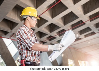 Architect at work in a construction site