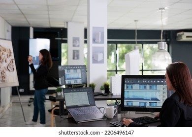 Architect Working In 3d Modeling Software, Multi Store Building Model On Computer Screen. Architecture Office Employee Working In Coworking Space, Real Estate Agency Tools, Plan Drafts.