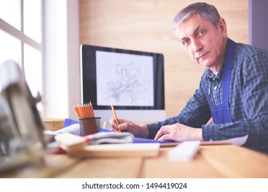 Architect working drawing table