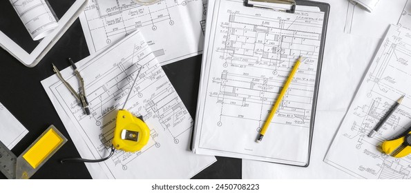 Architects concept, engineer architect designer freelance work on start-up project drawing, construction plan. architect design working drawing sketch plans blueprints and making construction model