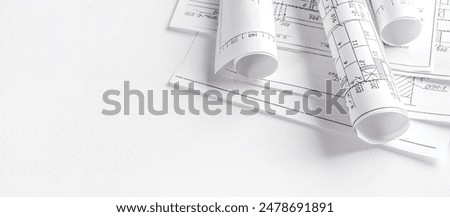 Architects concept, engineer architect designer freelance work on start-up project drawing, construction plan architect design working drawing sketch plans blueprints and making construction model