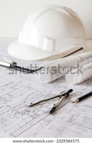 Architects concept,eco project house,Retrofit movement,engineer architect designer working drawing sketch plans blueprints and making construction eco model
