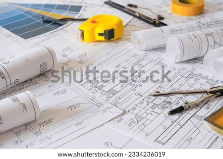 Architects concept,eco project house,Retrofit movement,engineer architect designer working drawing sketch plans blueprints and making construction eco model,architect project