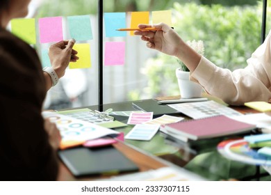 Architects designer team working with color palette chart. - Powered by Shutterstock