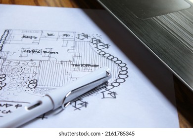 Architect's Desk, Sketch Paper, Notebook Computer Placed On A Wooden Table.