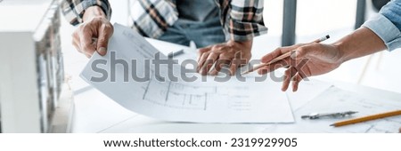 Architects interior designer hands working with Blue prints and documents for a home renovation for house design
 Сток-фото © 