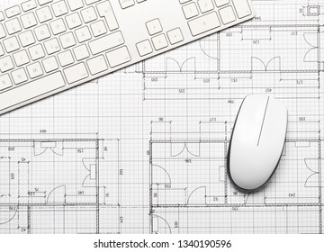 Architectural Blueprint House Building Plan With Computer Keyboard And Mouse On Table Flatlay Top View From Above