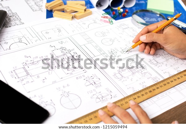 \
Architectural\
blueprints - drawings, pencil, calculator, calculations, plan,\
ruler, computer. Business and science.\
