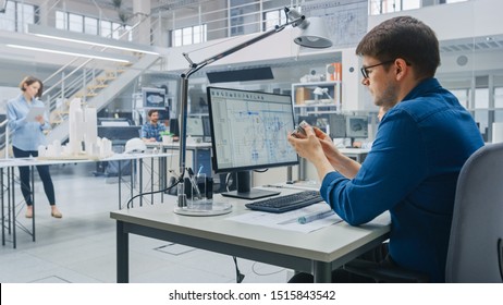 In Architectural Bureau: Team of Architects and Engineers Working on a Building Complex Prototype Project, Using City Model and Computers Running 3D CAD Software. Residential or Business District - Shutterstock ID 1515843542