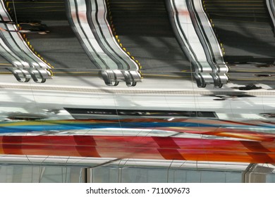 Architectural ceiling mirror reflection of escalator