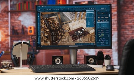 Architectural design software on computer in home office used for moving interior design project assets, close up. CAD software interface on PC display showing home floor plans, handheld camera shot
