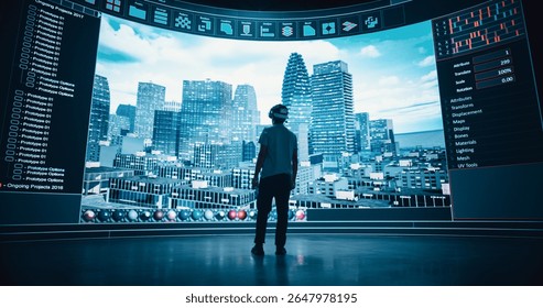 Architectural Designer in a VR Headset Designs Futuristic Cityscapes on a Big Panoramic Digital Screen that Reflects His Computer Vision. Virtual Reality Technology Innovation and Creativity Concept